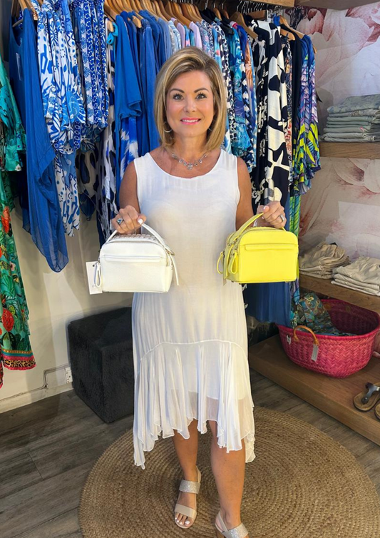 White sleeveless silk dress